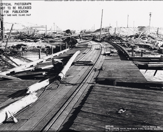 Debris from ammunition pier following the disaster. SS Quinault Victory wreckage in the background.
Photo Credit: Port Chicago Naval Magazine National Memorial  National Park Service
